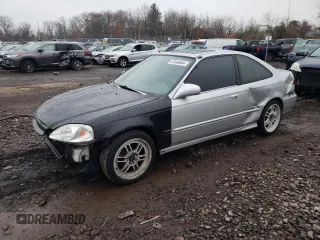 1999 Honda Civic EX with VIN 1HGEJ8140XL066559, listed as a Copart auction lot 82600804 with 323,648 mi miles and Salvage Title. Bid and sale history available at carsss.com. Image 1.