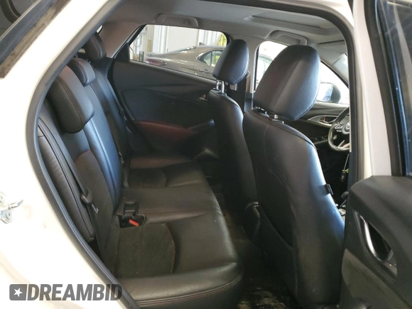 2018 Mazda CX-3 Grand Touring z VIN JM1DKFD7XJ0321776, wystawiony jako Copart lot #49093765 z przebiegiem 94 770 mil mil oraz Tytuł czysty. Historia ofert i sprzedaży dostępna na DreamBid. Obrazek 11.