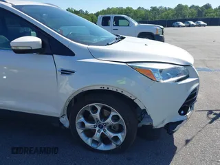2014 Ford Escape Titanium с VIN 1FMCU0J94EUB92694, выставлен на аукционе IAAI как лот 42124647 с пробегом 107 666 миль миль и . История ставок и продаж доступна на DreamBid. Изображение 12.