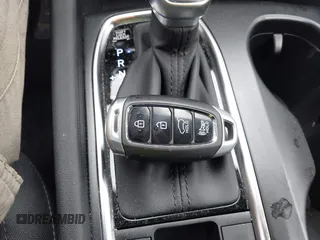 2019 Hyundai Santa Fe SEL z VIN 5NMS3CAD7KH035429, wystawiony jako IAAI lot #42323641 z przebiegiem 60 909 mil mil oraz . Historia ofert i sprzedaży dostępna na DreamBid. Obrazek 11.