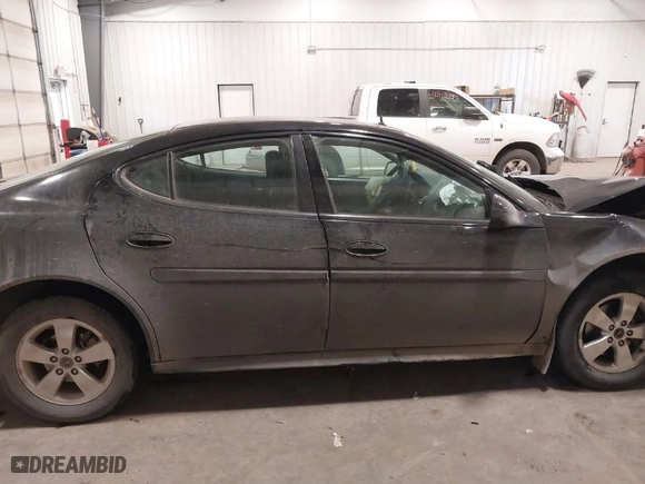 2005 Pontiac Grand Prix with VIN 2G2WP522851134112, listed as a IAAI auction lot 41339394 with 114,818 mi miles. Bid and sale history available at carsss.com. Image 13.