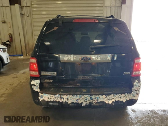 2010 Ford Escape Limited with VIN 1FMCU9EG3AKC87458, listed as a Copart auction lot 59057165 with 110,611 mi miles and Non repairable. Bid and sale history available at DreamBid. Image 6.