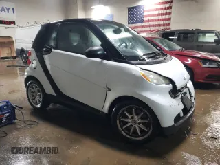 2009 Smart fortwo Pure z VIN WMEEJ31X69K258431, wystawiony jako Copart lot #43870485 z przebiegiem 64 935 mil mil oraz Szkoda całkowita • Salvage title. Historia ofert i sprzedaży dostępna na DreamBid. Obrazek 4.
