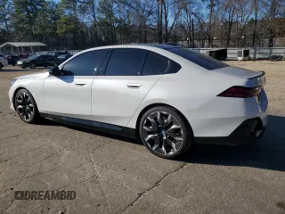 2024 BMW i5 M60 with VIN WBY43FK00RCP86174, listed as a Copart auction lot 45522685 with 7,392 mi miles and Salvage title. Bid and sale history available at DreamBid. Image 2.