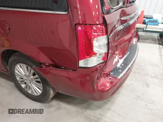 2015 Chrysler Town & Country Limited Platinum with VIN 2C4RC1GGXFR597180, listed as a IAAI auction lot 41374817 with 90,088 mi miles and . Bid and sale history available at DreamBid. Image 17.