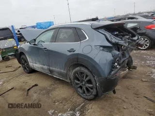 2024 Mazda CX-30 Premium z VIN 3MVDMBDY9RM712503, wystawiony jako Copart lot #44981225 z przebiegiem 3774 mil mil oraz Nie do naprawy • Non repairable. Historia ofert i sprzedaży dostępna na DreamBid. Obrazek 2.