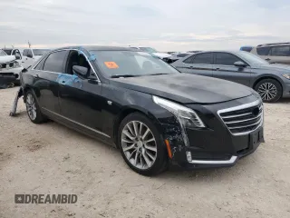 2018 Cadillac CT6 Luxury RWD z VIN 1G6KC5RX8JU103595, wystawiony jako Copart lot #47438045 z przebiegiem 135 004 mil mil oraz Czysty tytuł • Clean title. Historia ofert i sprzedaży dostępna na DreamBid. Obrazek 4.