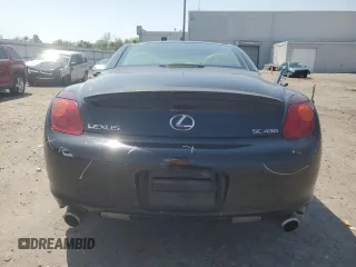 2002 Lexus SC 430 with VIN JTHFN48YX20026264, listed as a Copart auction lot 52571945 with 170,019 mi miles and Salvage Title. Bid and sale history available at DreamBid. Image 6.