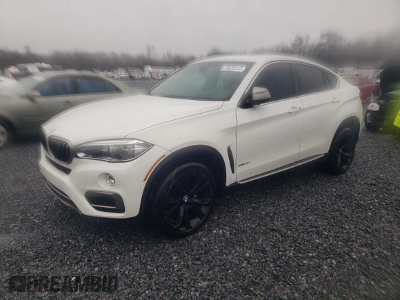 2015 BMW X6 xDrive35i with VIN 5UXKU2C59F0N76404, listed as a Copart auction lot 73426012 with 141,359 mi miles. Bid and sale history available at carsss.com. Image 1.