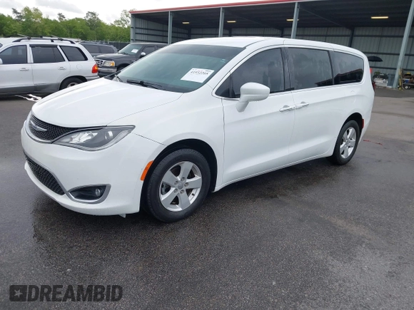 2020 Chrysler Pacifica Touring with VIN 2C4RC1FG4LR135808, listed as a IAAI auction lot 41932205 with 152,073 mi miles and . Bid and sale history available at DreamBid. Image 2.