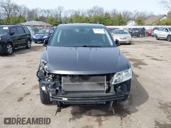 2019 Dodge Journey SE with VIN 3C4PDCBB8KT732028, listed as a IAAI auction lot 41902938 with 49,378 mi miles and . Bid and sale history available at DreamBid. Image 13.