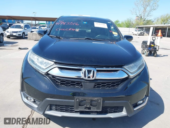 2018 Honda CR-V Touring with VIN 2HKRW2H91JH630702, listed as a IAAI auction lot 41983516 with 84,355 mi miles. Bid and sale history available at carsss.com. Image 12.