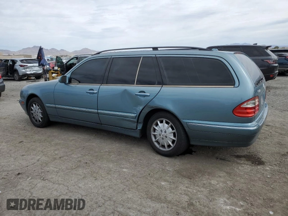 2001 Mercedes-Benz E-Class with VIN WDBJH65J01B292156, listed as a Copart auction lot 49556935 with 179,223 mi miles and Salvage Title. Bid and sale history available at carsss.com. Image 2.