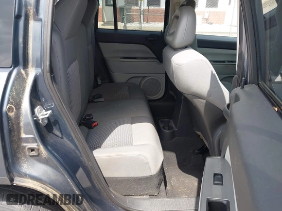 2007 Jeep Compass Sport with VIN 1J8FF47W17D597598, listed as a IAAI auction lot 42157027 with 153,043 mi miles and . Bid and sale history available at carsss.com. Image 8.