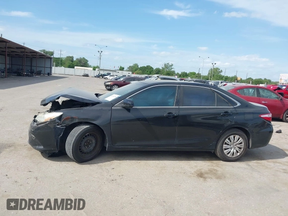 2015 Toyota Camry XLE with VIN 4T1BF1FK7FU037419, listed as a IAAI auction lot 42053259 with 118,453 mi miles and . Bid and sale history available at DreamBid. Image 14.