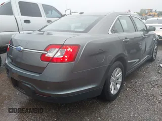 2011 Ford Taurus SE with VIN 1FAHP2DW2BG181059, listed as a IAAI auction lot 42036867 with 103,394 mi miles. Bid and sale history available at carsss.com. Image 4.