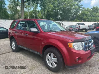 2011 Ford Escape XLS with VIN 1FMCU0C73BKA42966, listed as a IAAI auction lot 42751351 with 107,832 mi miles and . Bid and sale history available at DreamBid. Image 1.