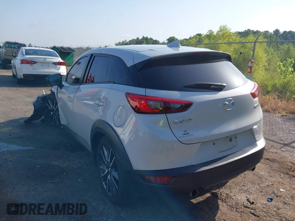 2018 Mazda CX-3 Touring with VIN JM1DKDC73J0319938, listed as a IAAI auction lot 39861564 with 117,199 mi miles. Bid and sale history available at carsss.com. Image 3.