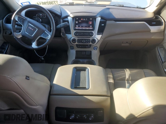 2015 GMC Yukon XL SLT with VIN 1GKS1HKC6FR166415, listed as a Copart auction lot 73029014 with 105,209 mi miles and Salvage Title. Bid and sale history available at carsss.com. Image 8.