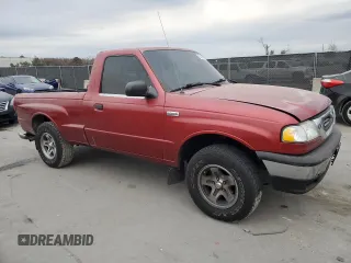 2000 Mazda B-Series 2WD Truck SX with VIN 4F4YR12C2YTM30989, listed as a Copart auction lot 88946185 with 250,368 mi miles and Salvage Title. Bid and sale history available at carsss.com. Image 4.