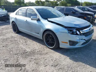2010 Ford Fusion Hybrid with VIN 3FADP0L35AR354431, listed as a IAAI auction lot 42107722 with 142,250 mi miles. Bid and sale history available at carsss.com. Image 1.