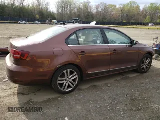 2017 Volkswagen Jetta SEL with VIN 3VWL17AJ1HM202345, listed as a Copart auction lot 51624555 with 117,344 mi miles and Salvage title. Bid and sale history available at DreamBid. Image 3.