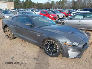 2021 Ford Mustang GT with VIN 1FA6P8CF9M5153818, listed as a IAAI auction lot 41663823 with 31,806 mi miles. Bid and sale history available at carsss.com. Image 1.