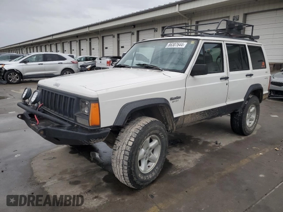 1996 Jeep Cherokee Sport with VIN 1J4FJ68S9TL284984, listed as a Copart auction lot 86307644 with 136,142 mi miles and Salvage Title. Bid and sale history available at carsss.com. Image 1.