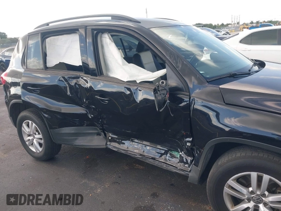 2017 Volkswagen Tiguan S with VIN WVGAV7AX5HW509161, listed as a IAAI auction lot 42537359 with 85,377 mi miles and . Bid and sale history available at DreamBid. Image 6.