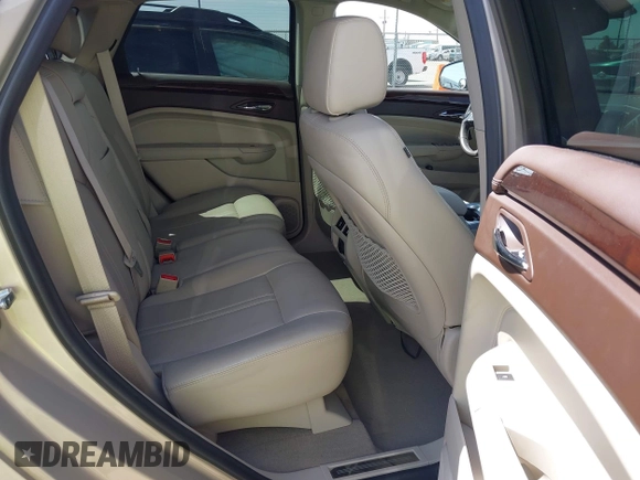 2011 Cadillac SRX Luxury Collection with VIN 3GYFNAEY7BS673549, listed as a IAAI auction lot 42068397 with 71,092 mi miles and . Bid and sale history available at DreamBid. Image 8.
