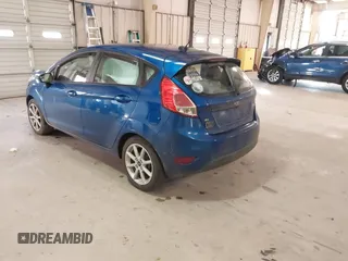 2019 Ford Fiesta SE with VIN 3FADP4EJ6KM124270, listed as a IAAI auction lot 40962134 with 122,757 mi miles. Bid and sale history available at carsss.com. Image 3.