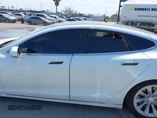 2018 Tesla Model S 75D with VIN 5YJSA1E25JF245269, listed as a IAAI auction lot 41914567 with 56,086 mi miles and . Bid and sale history available at DreamBid. Image 15.