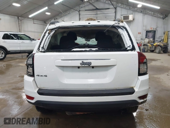 2014 Jeep Compass Sport with VIN 1C4NJDBB3ED773960, listed as a IAAI auction lot 41989986 with 126,875 mi miles. Bid and sale history available at carsss.com. Image 16.