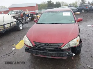 2004 Toyota Camry LE with VIN 4T1BE32K04U314445, listed as a IAAI auction lot 42017413 with 137,702 mi miles. Bid and sale history available at carsss.com. Image 13.