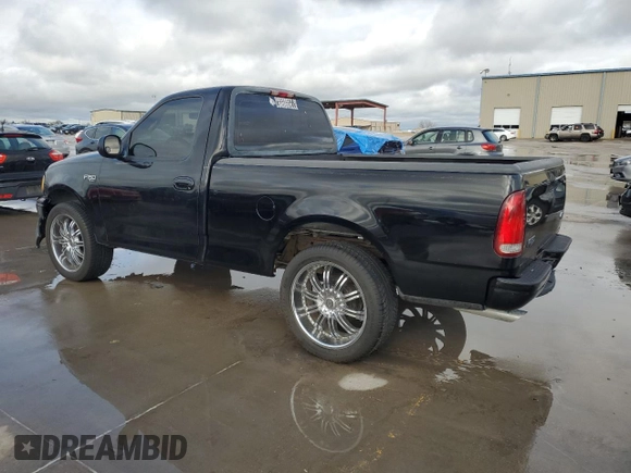 2000 Ford F-150 XL with VIN 1FTZF1725YNB93067, listed as a Copart auction lot 86750464 with Not provided miles and Salvage title. Bid and sale history available at DreamBid. Image 2.