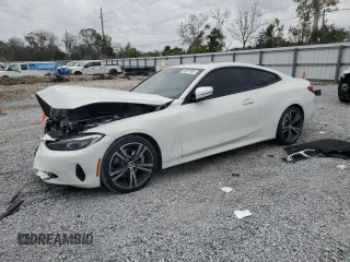 2023 BMW 4 Series 430i with VIN WBA53AP00PCL74865, listed as a Copart auction lot 89057895 with 9,000 mi miles and Salvage Title. Bid and sale history available at DreamBid. Image 1.