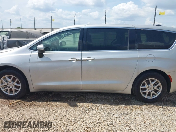 2023 Chrysler Pacifica Touring L with VIN 2C4RC1BG7PR521232, listed as a IAAI auction lot 42087909 with 34,609 mi miles and . Bid and sale history available at DreamBid. Image 13.