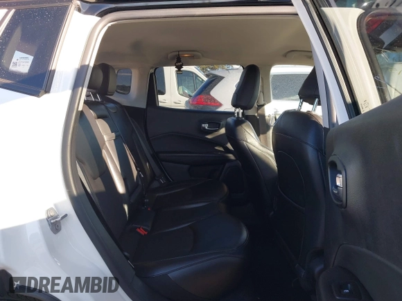 2020 Jeep Compass Latitude with VIN 3C4NJDBB9LT139639, listed as a IAAI auction lot 41695315 with 64,927 mi miles and . Bid and sale history available at DreamBid. Image 8.