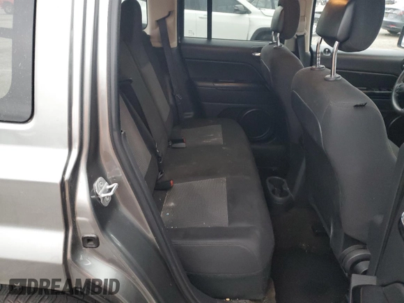 2014 Jeep Patriot Altitude with VIN 1C4NJPBAXED595327, listed as a Copart auction lot 53665005 with 134,771 mi miles and Salvage Title. Bid and sale history available at DreamBid. Image 12.