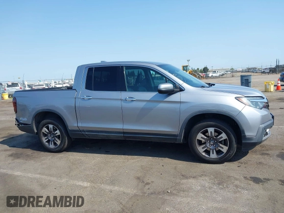2019 Honda Ridgeline RTL-E with VIN 5FPYK3F79KB029771, listed as a IAAI auction lot 42448369 with 90,142 mi miles and . Bid and sale history available at DreamBid. Image 13.