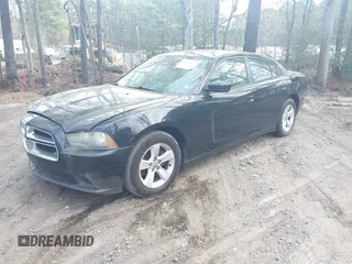 2013 Dodge Charger SE with VIN 2C3CDXBG6DH566853, listed as a IAAI auction lot 41924747 with 212,916 mi miles. Bid and sale history available at carsss.com. Image 2.