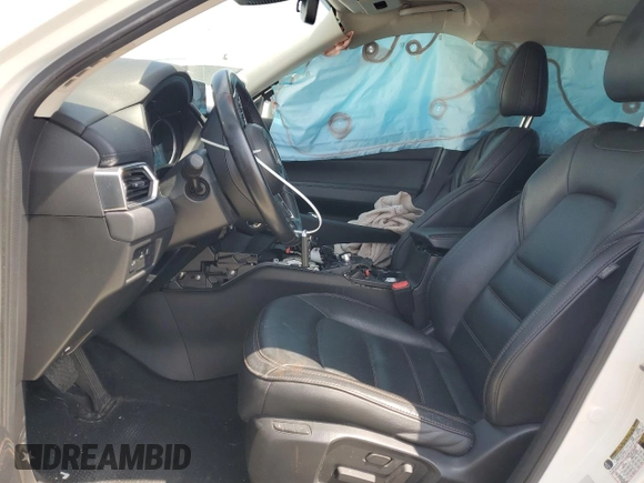 2018 Mazda CX-5 Grand Touring z VIN JM3KFADM3J1464073, wystawiony jako Copart lot #59571385 z przebiegiem Nie podano mil oraz Szkoda całkowita • Salvage title. Historia ofert i sprzedaży dostępna na DreamBid. Obrazek 7.