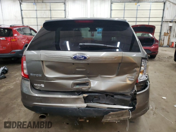2014 Ford Edge SEL z VIN 2FMDK4JC2EBA50332, wystawiony jako Copart lot #87367284 z przebiegiem 164 873 mil mil oraz Szkoda całkowita • Salvage title. Historia ofert i sprzedaży dostępna na DreamBid. Obrazek 6.