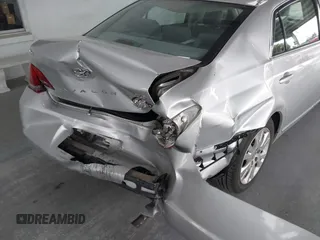 2009 Toyota Avalon XL with VIN 4T1BK36B69U341854, listed as a IAAI auction lot 41727553 with 102,369 mi miles. Bid and sale history available at carsss.com. Image 6.