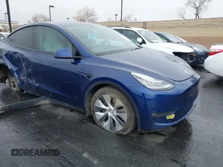 2022 Tesla Model Y Long Range with VIN 7SAYGDEE7NF409294, listed as a IAAI auction lot 41845261 with 73,116 mi miles. Bid and sale history available at carsss.com. Image 1.
