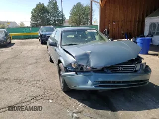 2001 Toyota Camry CE z VIN JT2BG22K410538709, wystawiony jako Copart lot #53295905 z przebiegiem 223 115 mil mil oraz Szkoda całkowita • Salvage title. Historia ofert i sprzedaży dostępna na DreamBid. Obrazek 11.