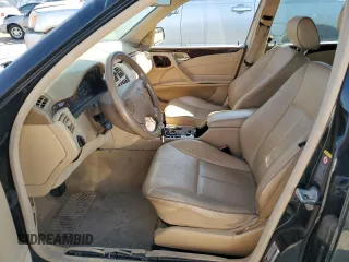 2001 Mercedes-Benz E-Class AWD with VIN WDBJF83J31X058259, listed as a Copart auction lot 74370604 with 131,454 mi miles and Clean Title. Bid and sale history available at carsss.com. Image 7.