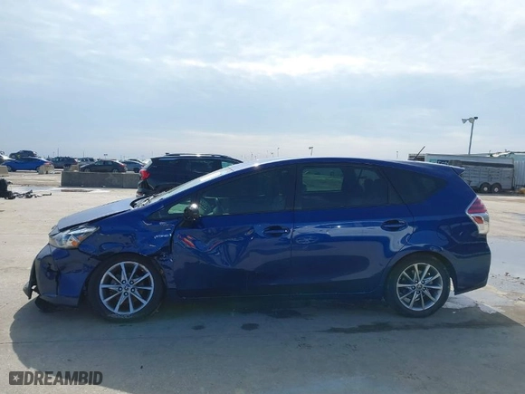 2015 Toyota Prius v Two with VIN JTDZN3EU4FJ028506, listed as a IAAI auction lot 41575533 with 103,580 mi miles. Bid and sale history available at carsss.com. Image 14.