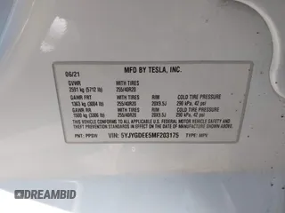 2021 Tesla Model Y Long Range with VIN 5YJYGDEE5MF203175, listed as a IAAI auction lot 41758334 with 63,387 mi miles and . Bid and sale history available at DreamBid. Image 9.