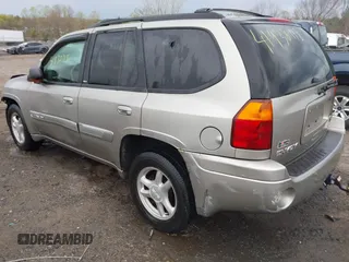 2003 GMC Envoy SLE with VIN 1GKDT13S932108979, listed as a IAAI auction lot 41938118 with 1 mi miles. Bid and sale history available at carsss.com. Image 3.